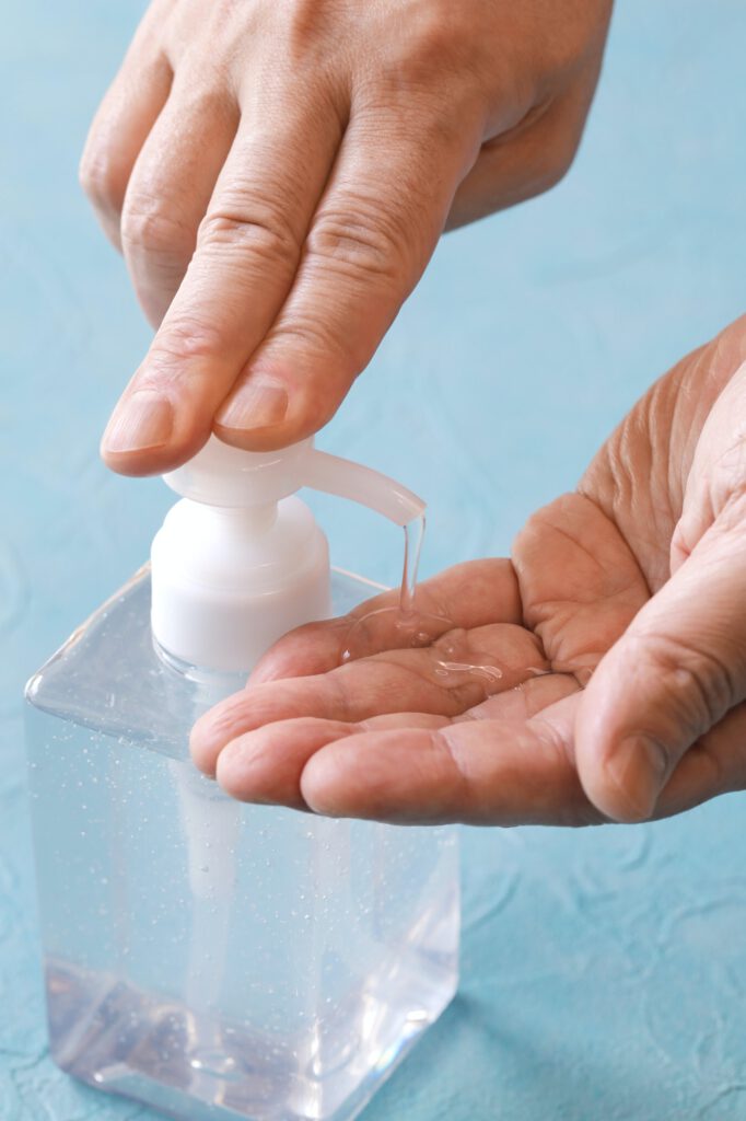 hand washing with alcohol sanitizer gel
